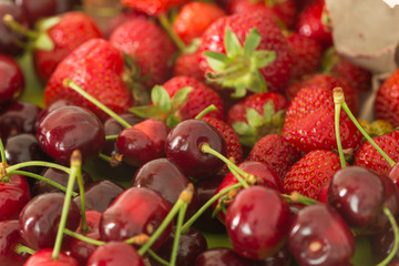 Fresh strawberries and cherries / fruit season