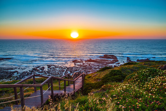 Sunset on the Atlantic Coast near Rogil in Algarve, Portugal