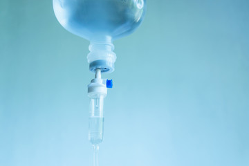  close up the saline solution bottle hanging brine for patients in the room concept.