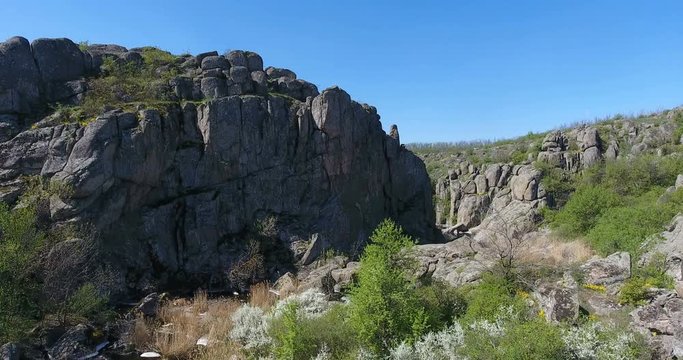 Aerial view of mountain river in narrow gorge. Clean nature in mountain canyon. Top down view of fast moving River