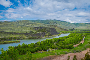Beautiful landscape of the Snake River meandering through the desert of Idaho. The Snake River provides world class fishing, hunting, and recreation
