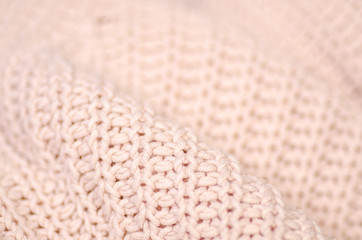 Beige knitted sweater texture fabric textile macro blur background