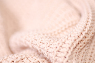 Beige knitted sweater texture fabric textile macro blur background