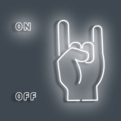 Neon sign hand that rocks finger.White sign on a Gray