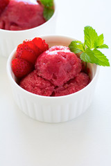Fruit strawberry sorbet with mint in bowl on white wooden background. - obrazy, fototapety, plakaty