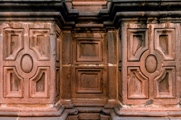 Close-up of stone moldings on the wall of a church in Cusco, Peru