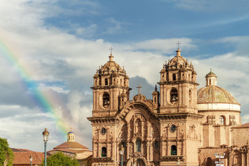 Fototapeta na wymiar Portal Church of Belen with rainbow in front of the main square of Cusco (Peru)