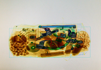 Scanned baggage on the x-ray scanner screen in the airport