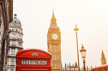 Obraz na płótnie Canvas London symbols with BIG BEN and red PHONE BOOTHS in England, UK