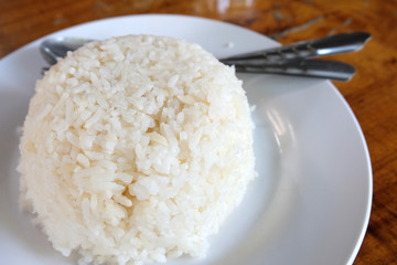 close up steam rice on plate ,soft focus