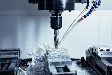 Metalworking CNC milling machine. Cutting metal modern processing technology. - obrazy, fototapety, plakaty