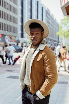 Handsome black man walking in city
