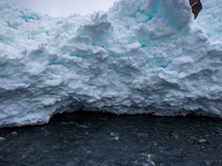 Blue snow near glacier