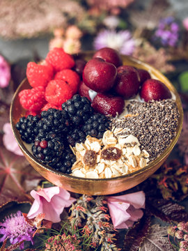 Tasty breakfast with fruits in bowl