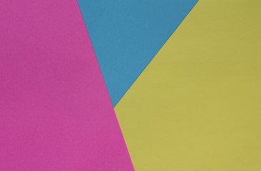 Creative geometric  paper background. Pink, blue, yellow colors. Abstraction. Template.