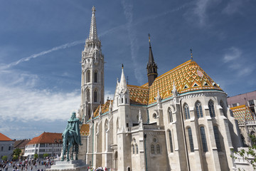 Fototapeta premium The Matthias church and statue of Stephen I the first king of Hungary 