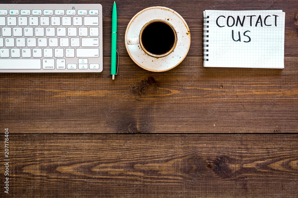 Poster template for contacts, background for contact information. lettering contact us in notebook on offic