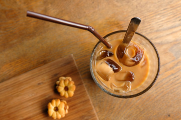 Close up a cup of coffee and cookie