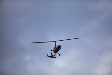 Fototapeta na wymiar autogyro in the sky