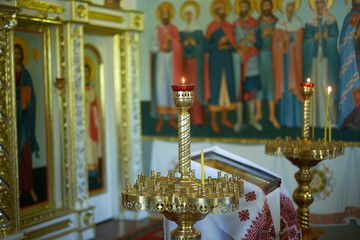 Holy Bible, Orthodox cross and Bowl prepared for christening ceremony