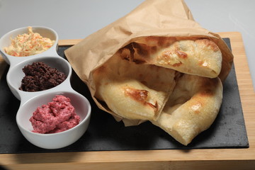 Garlic bread in paper bag