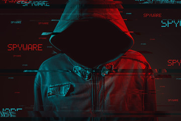 Spyware concept with faceless hooded male person © Bits and Splits