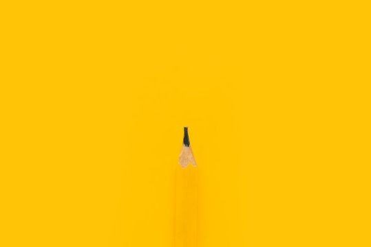 Classic Yellow Carpenter Handyman Pencil On Same Color Background