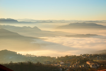 Landscape of nature in the fog of  San Marino country in Italy