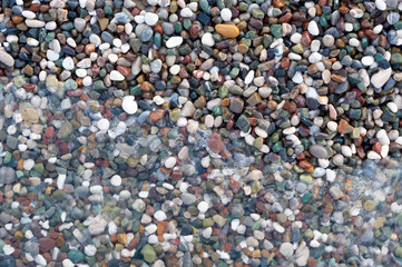 Sea pebbles on the shoreline, close-up