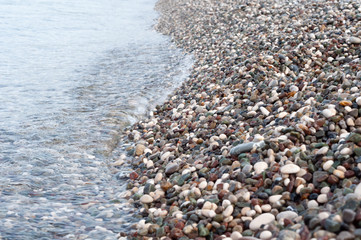 Sea pebbles on the shoreline, close-up