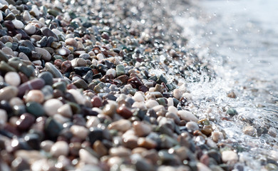 Sea pebbles on the shoreline, close-up