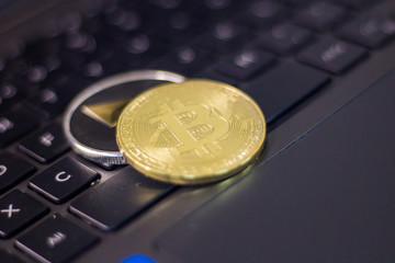 Metal Bitcoins and Ethereum coins. Bitcoin, Ethereum - modern virtual eletronic money