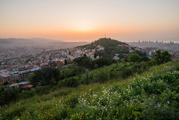 Beautiful viewpoint of Barcelona at sunrise, natural location in spring.