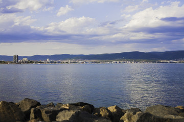 Beautiful seascape: blue sea, skyline and cityscape.