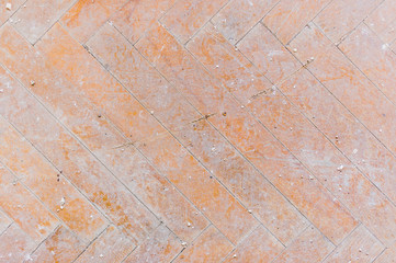 A close-up of an old faded parquet covered with dust and dirt. Result of repair. Cleaning and cleaning required