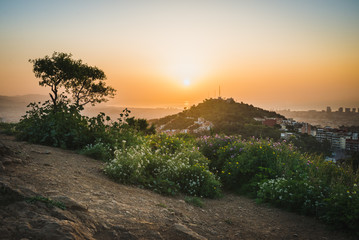 Beautiful viewpoint of Barcelona at sunrise, natural location in spring.