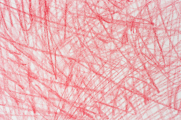 red crayon doodles on paper background texture