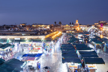 blue evening with might lights on the market in Marrakech in Morocco