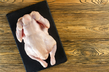 Fresh chicken, ready to cook. Recipe chicken carcass. Top view, space for Your text.