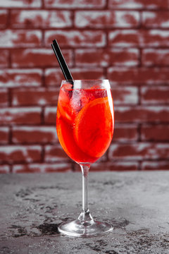 Glass of aperol spritz cocktail long drink close up.