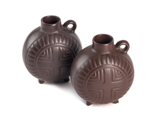 traditional Georgian ceramic utensils (chinchila) for wine on a white background