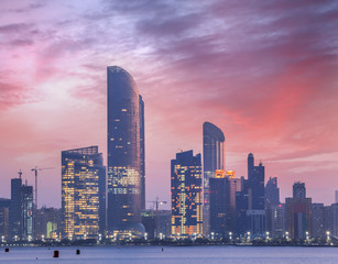 Fototapeta na wymiar Skyscrapers in the evening, Abu Dhabi, United Arab Emirates