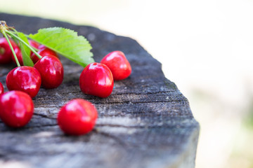 Cherry on a wooden background
