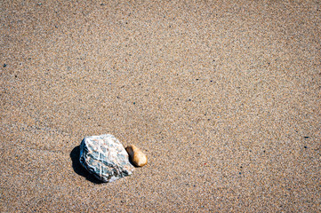 Pebbles on sand