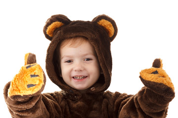 baby in teddy bear costume on white background