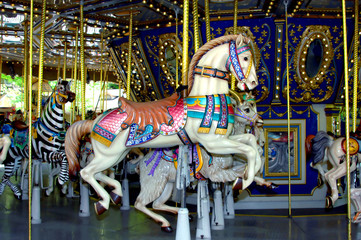 Fototapeta na wymiar Horse Ride on Carousel