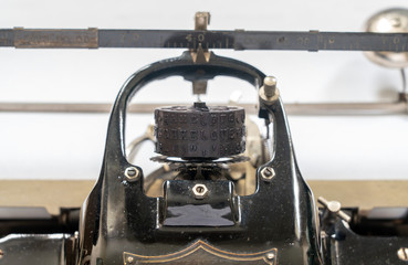 Ancient vintage portable typewriter with ball type typeface head