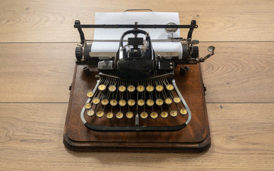 Ancient vintage portable typewriter with non qwerty keyboard