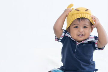 cute baby in fancy deer hat smiling