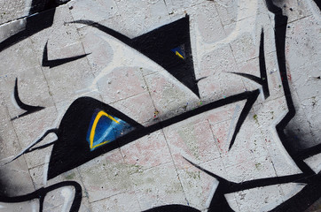 Street art. Abstract background image of a fragment of a colored graffiti painting in chrome and...